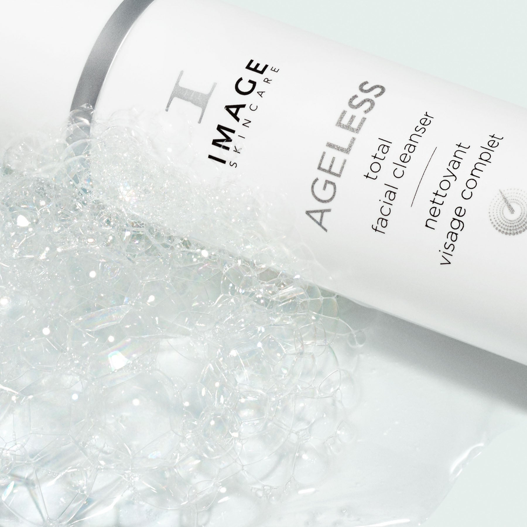 IMAGE Skincare Ageless Total Facial Cleanser bottle with bubbles - glycolic acid cleanser for exfoliating and revitalizing skin